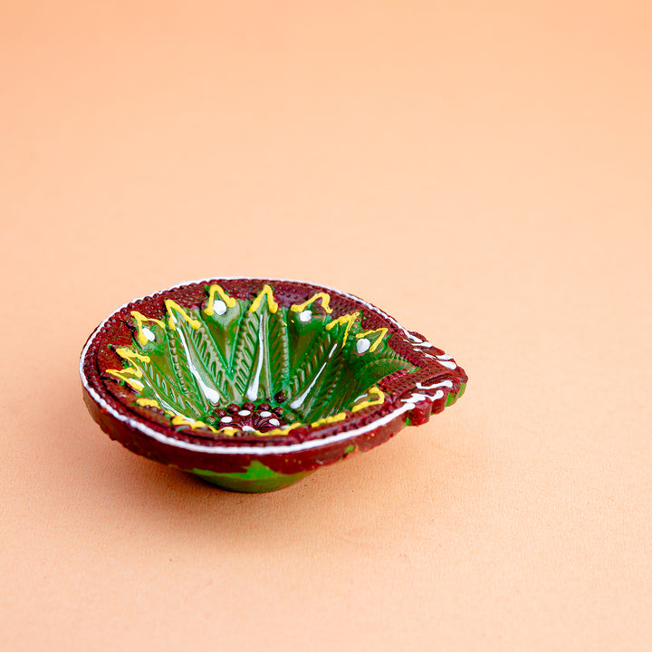 Vibrant Leaf Motif Terracotta Diya