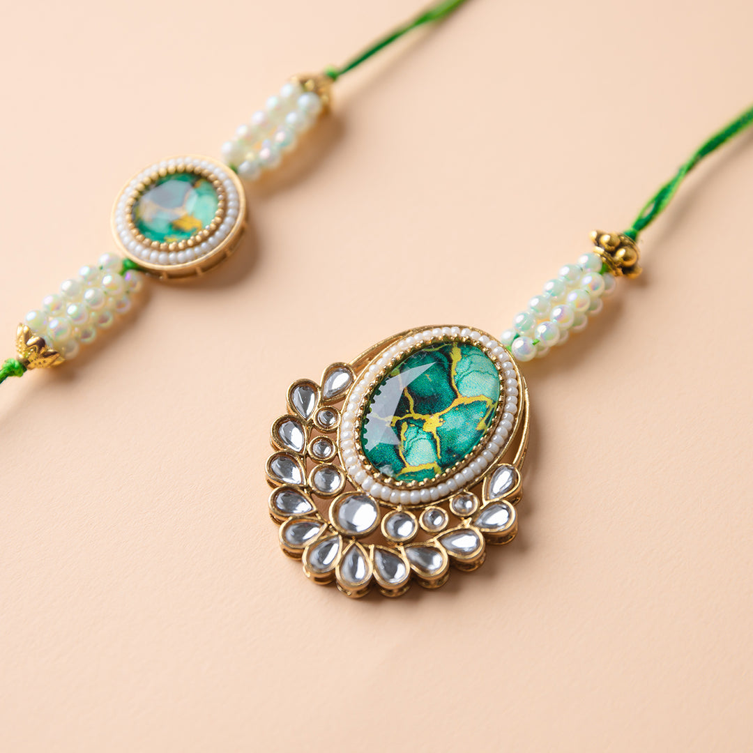 Sharvani-Shakti Couple Rakhi Set