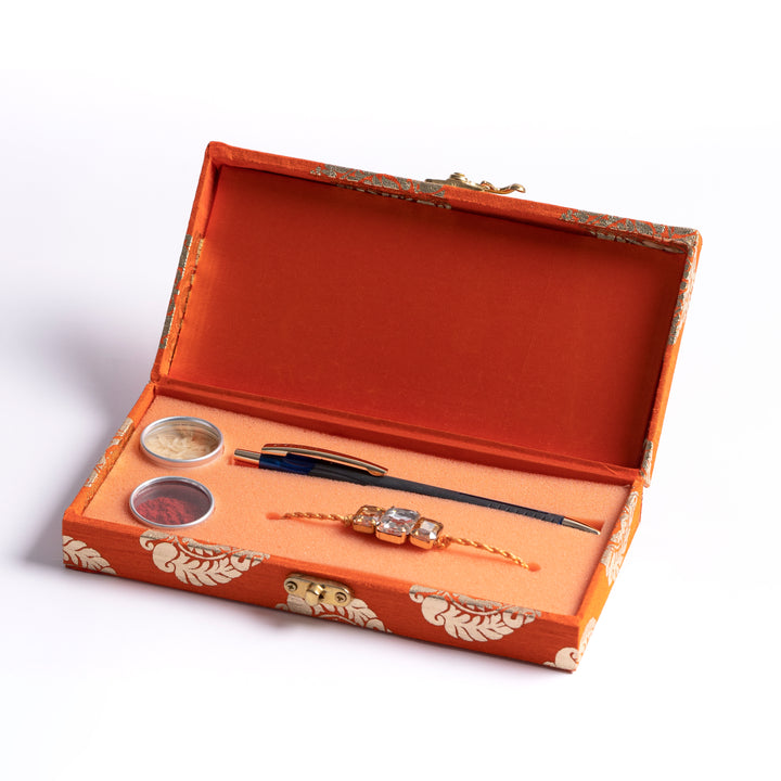 Orange Rakhi with Pen Gift Set